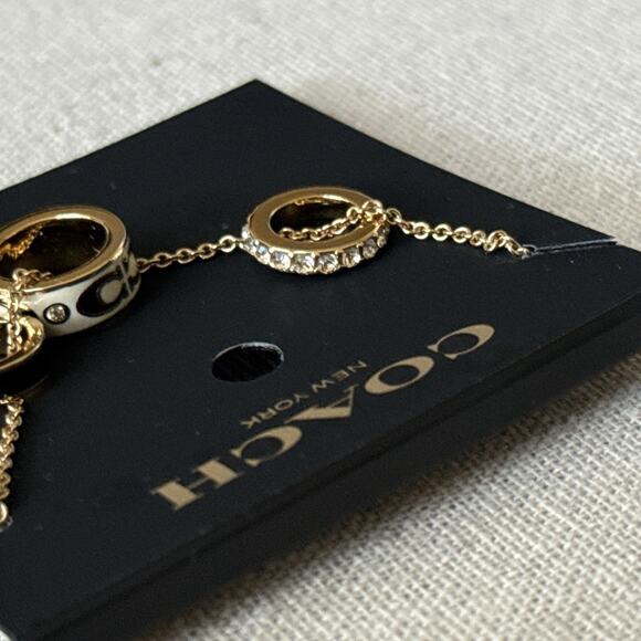 Coach Multi-Ring Pendant Necklace Gold Cream Black Enamel Crystal NWT 16”+2” - Picture 7 of 10